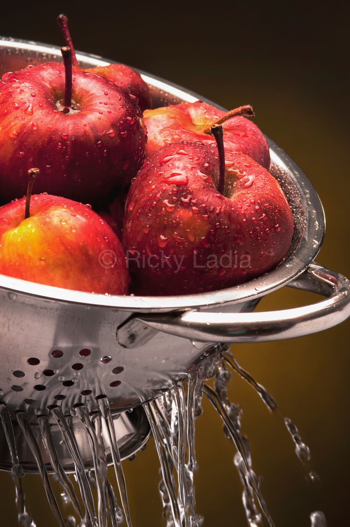 Washing Ton Apples by Ricky Ladia